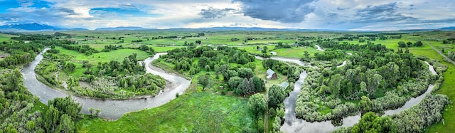 birds eye view of property featuring a mountain view