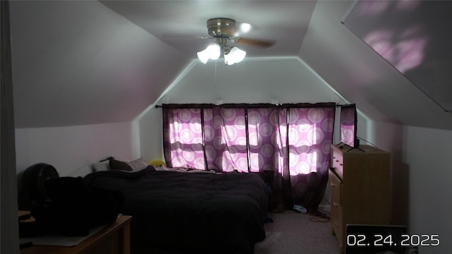 carpeted bedroom with lofted ceiling and ceiling fan