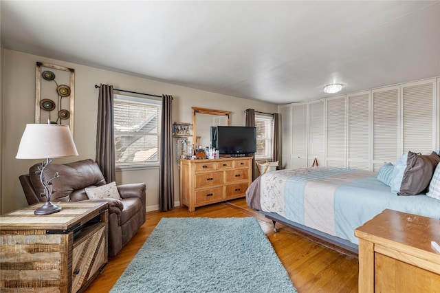 bedroom with light wood-type flooring