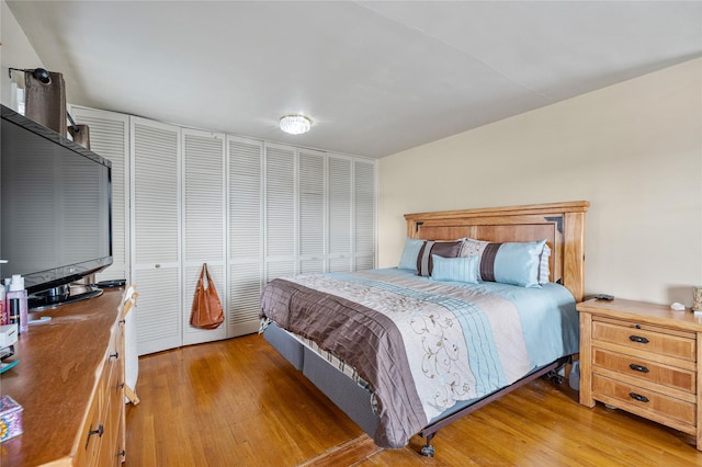 bedroom featuring light wood-style flooring