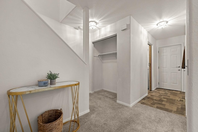 312 Ponderosa St, Kalispell, MT 59901 - corridor with baseboards and carpet