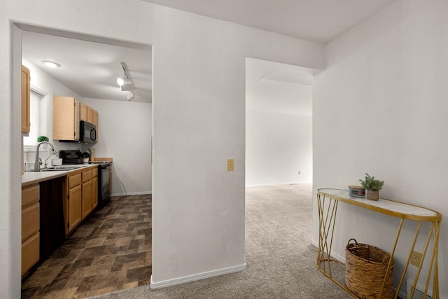 312 Ponderosa St, Kalispell, MT 59901 - kitchen featuring black appliances and light countertops