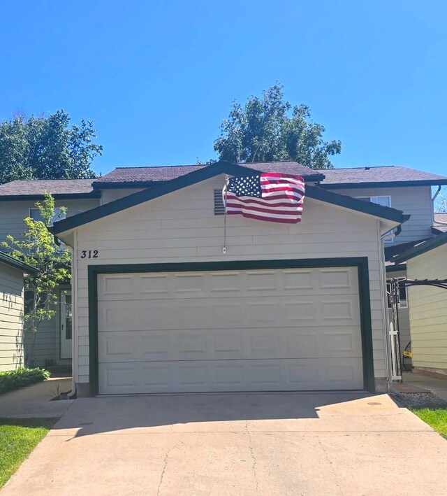 312 Ponderosa St, Kalispell, MT 59901 - garage featuring concrete driveway