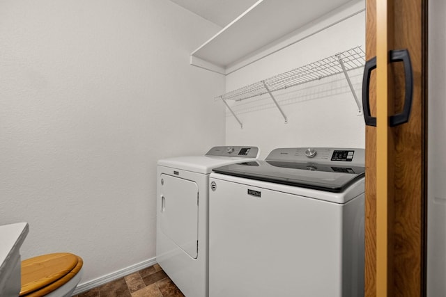312 Ponderosa St, Kalispell, MT 59901 - laundry room featuring washer and clothes dryer