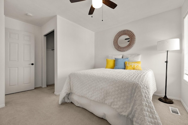 312 Ponderosa St, Kalispell, MT 59901 - carpeted bedroom with a ceiling fan and multiple windows