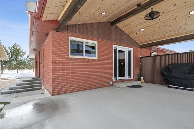 view of snow covered patio