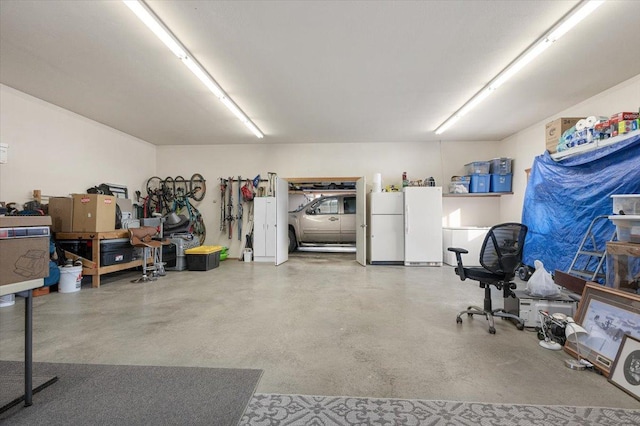 garage with freestanding refrigerator