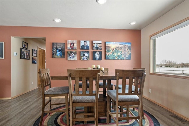 dining area featuring recessed lighting, wood finished floors, visible vents, and baseboards