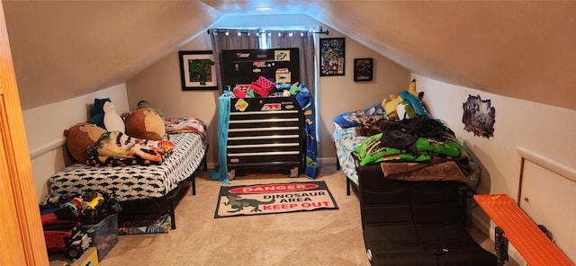 interior space featuring carpet flooring and vaulted ceiling