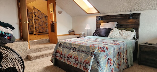 bedroom with vaulted ceiling with skylight, a textured ceiling, baseboards, and carpet flooring