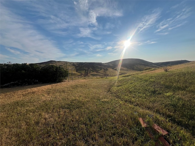 view of mountain feature with a rural view