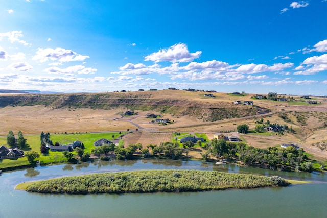 aerial view featuring a water view and a rural view