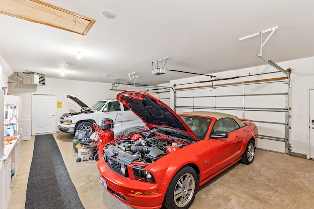 parking deck featuring a garage door opener