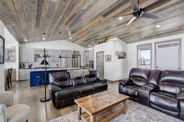 living room with light wood finished floors, wood ceiling, vaulted ceiling, and recessed lighting