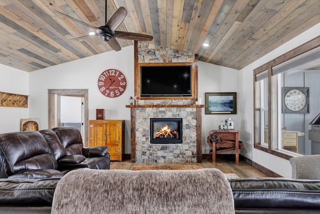 living area featuring wood ceiling, plenty of natural light, and wood finished floors