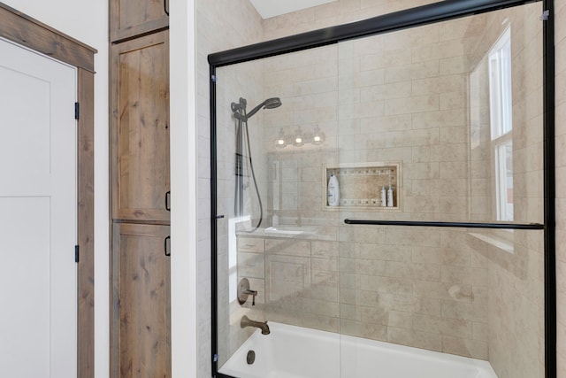 bathroom with enclosed tub / shower combo