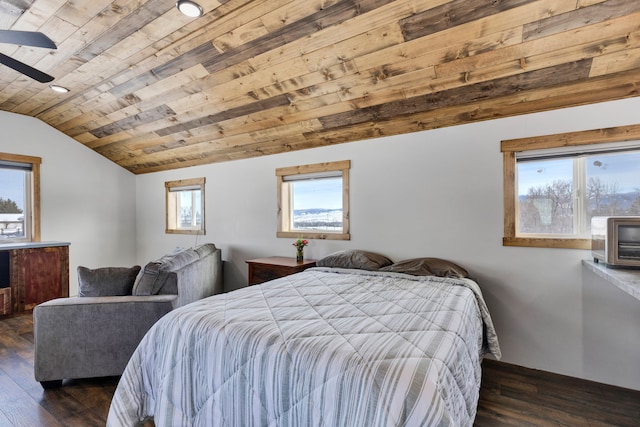 bedroom with lofted ceiling, dark wood-style floors, and wood ceiling