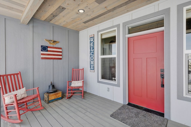 entrance to property featuring covered porch