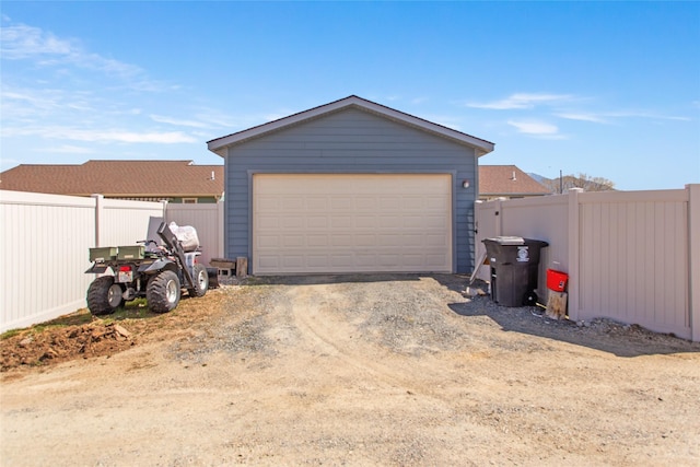 detached garage with fence