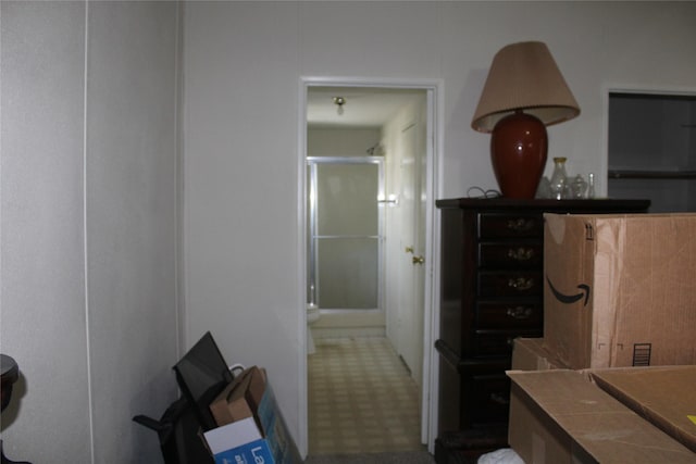 full bath with a stall shower and tile patterned floors