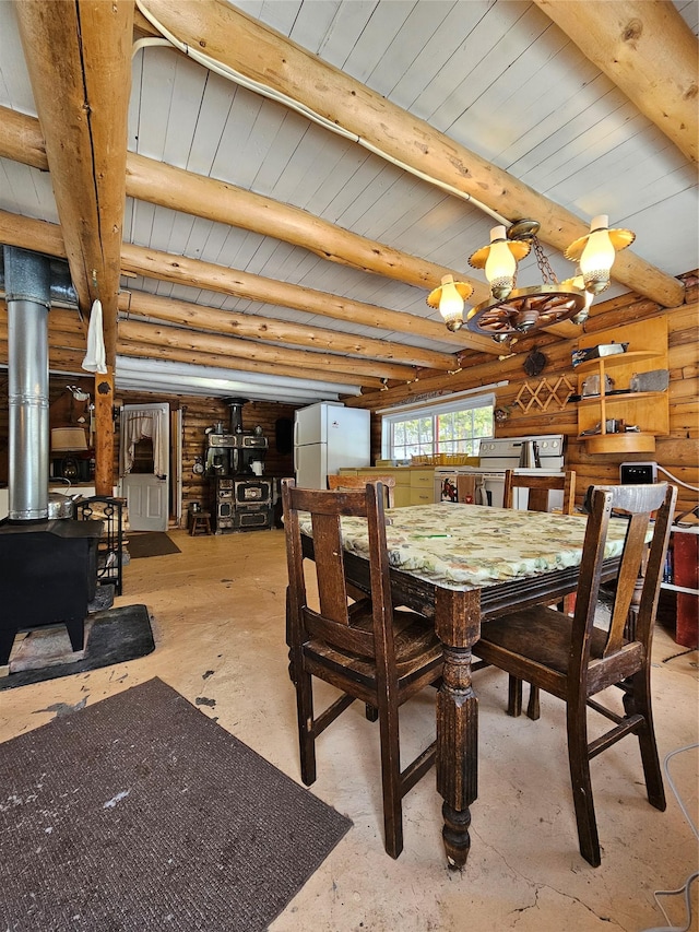 dining area featuring wood ceiling, beam ceiling, and a wood stove