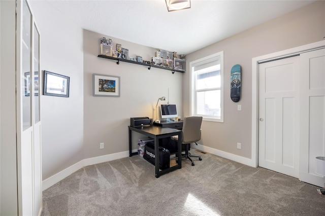 office area with baseboards and carpet flooring