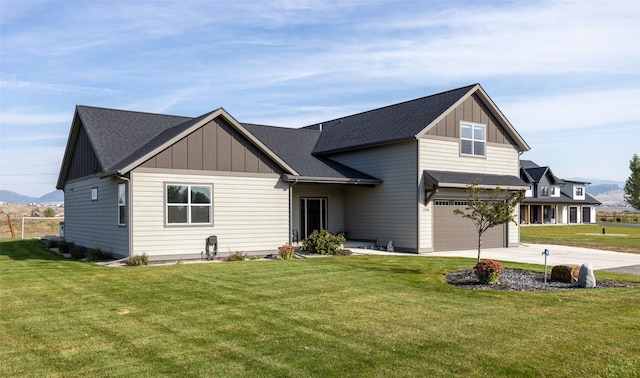 view of front of house featuring board and batten siding and a front yard