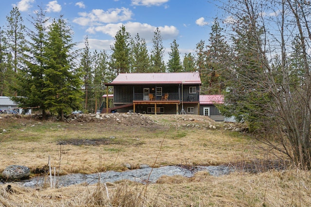 back of property with metal roof