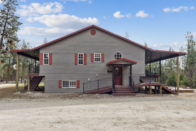 view of front of house featuring stairs