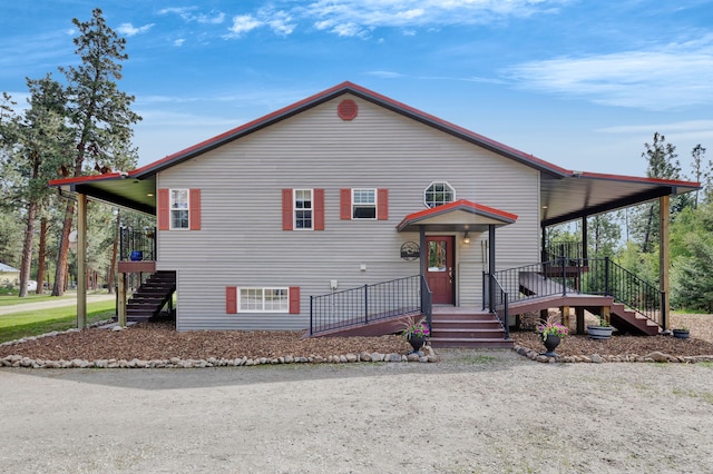 1743 Nighthawk Trl, Victor, MT 59875 - view of front of home with stairway and driveway