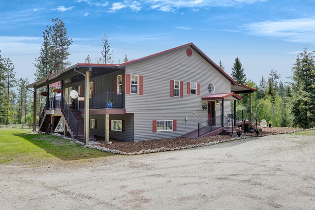 1743 Nighthawk Trl, Victor, MT 59875 - view of front of home featuring stairs