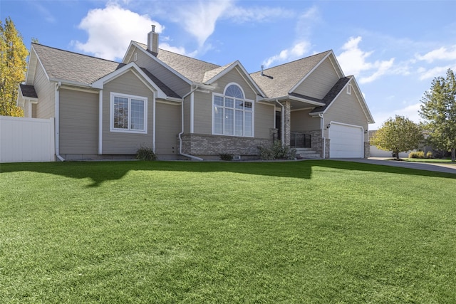 view of front of property with an attached garage, brick siding, fence, concrete driveway, and a front yard