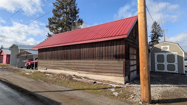 403 Dakota Ave, Libby, MT 59923 - view of side of home featuring metal roof