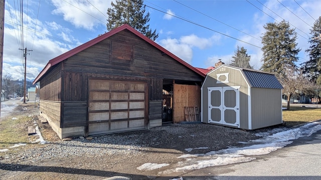 403 Dakota Ave, Libby, MT 59923 - detached garage with dirt driveway