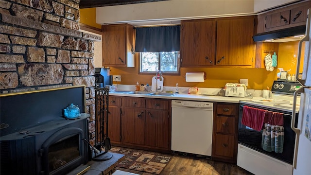 403 Dakota Ave, Libby, MT 59923 - kitchen with dishwasher, electric range, light countertops, a sink, and dark wood-type flooring