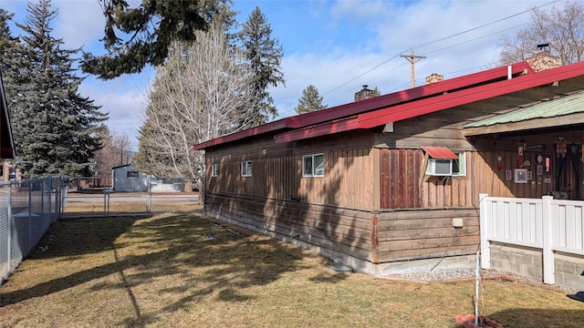 403 Dakota Ave, Libby, MT 59923 - view of side of home featuring a chimney