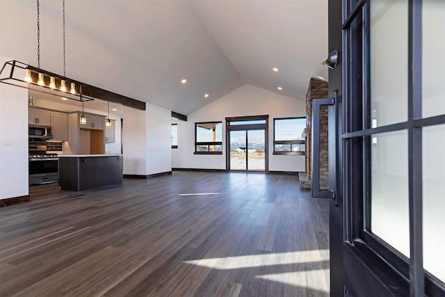 unfurnished living room with high vaulted ceiling, dark wood-style flooring, recessed lighting, and baseboards