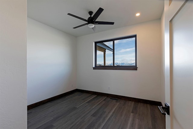 unfurnished room with ceiling fan, baseboards, dark wood-style flooring, and recessed lighting