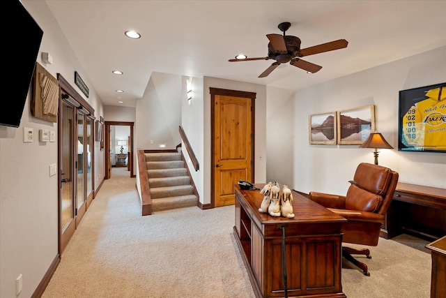 home office featuring recessed lighting, baseboards, ceiling fan, and light colored carpet