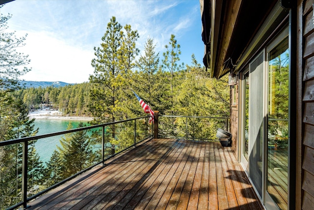 deck featuring a view of trees