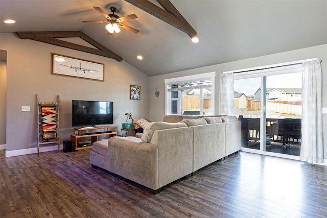 living area with vaulted ceiling with beams, dark wood-type flooring, a ceiling fan, and baseboards