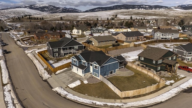 drone / aerial view with a residential view and a mountain view