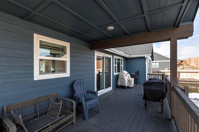 deck featuring fence and area for grilling