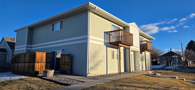 view of home's exterior featuring a balcony