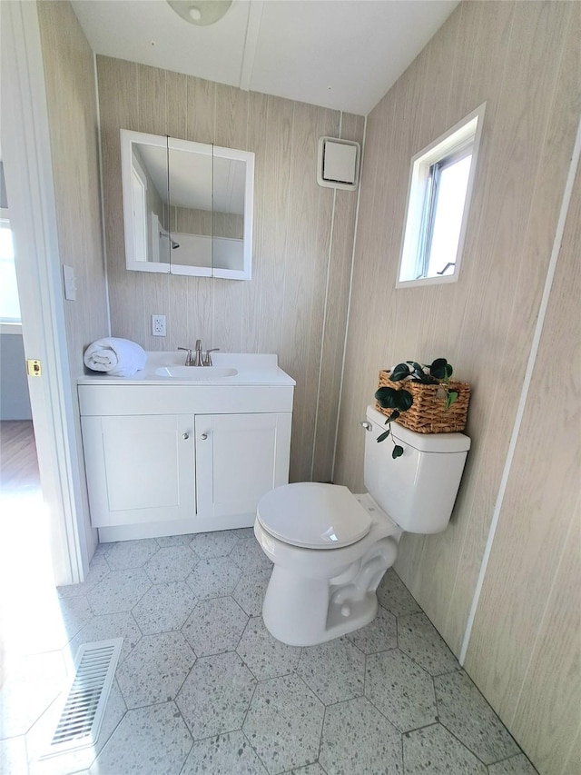 2968 Sunnyside Rd, Helena, MT 59602 - bathroom with toilet, vanity, and tile patterned floors