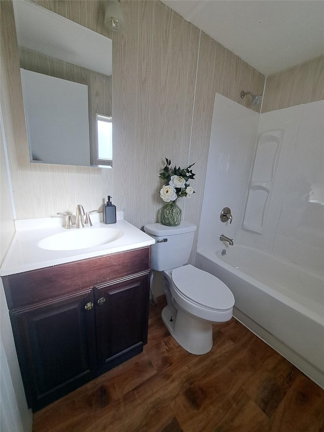 2968 Sunnyside Rd, Helena, MT 59602 - full bath featuring toilet, vanity,  shower combination, and wood finished floors
