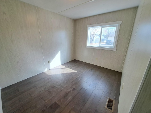 2968 Sunnyside Rd, Helena, MT 59602 - unfurnished room featuring dark wood-type flooring
