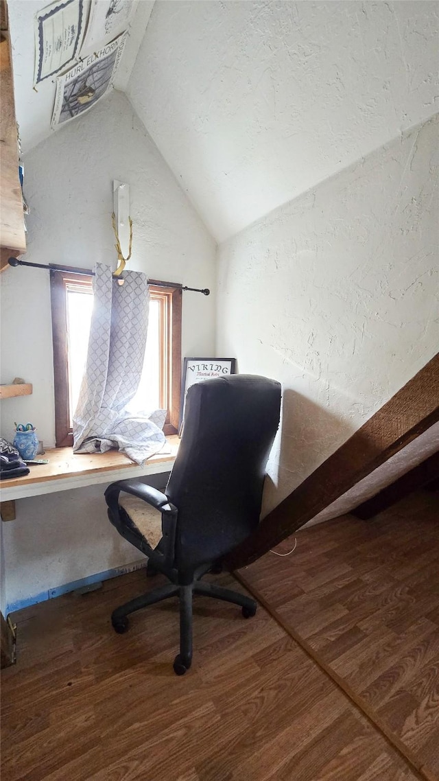 office area featuring vaulted ceiling and wood finished floors