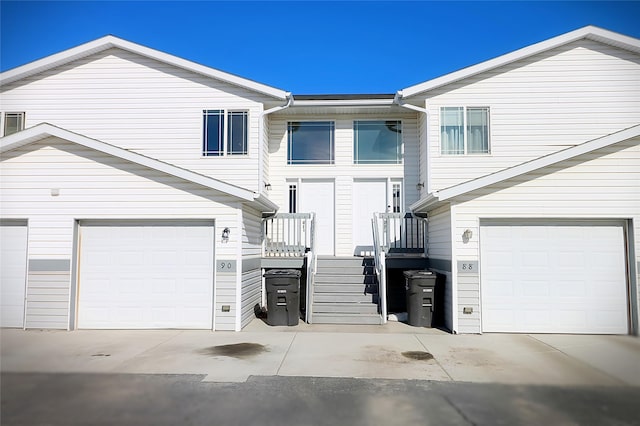 view of side of home featuring a garage