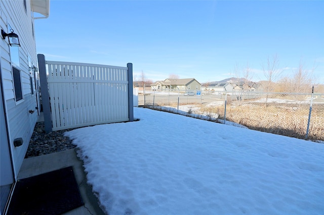 view of yard with a residential view and fence